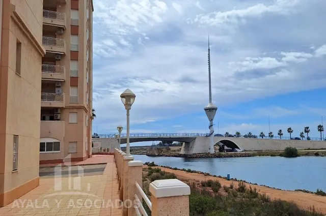 Apartamento en venta con terraza, piscina comunitaria y plaza de garaje, en la manga del mar menor, zona del estacio — 28