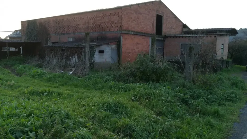 TERRENO Y EDIFICIO EN VENTA