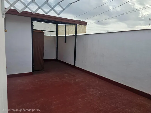 Piso de 4 dormitorios con plaza de garaje en San Basilio, con terraza de 20 m2 anexa al trastero en la cubierta. — 46