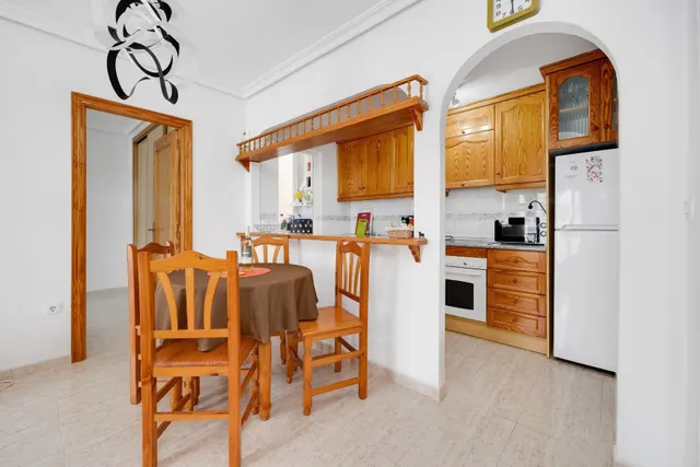 Apartamento dúplex con piscina comunitaria, Alicante, Orihuela Costa. 2 habitaciones, 89 m2, 1,6 kilómetros del mar — 10