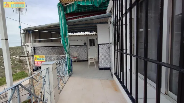 CASA EN VENTA CON COCHERA — 12