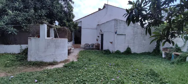PARCELA CON TRES APARTAMENTOS — 33