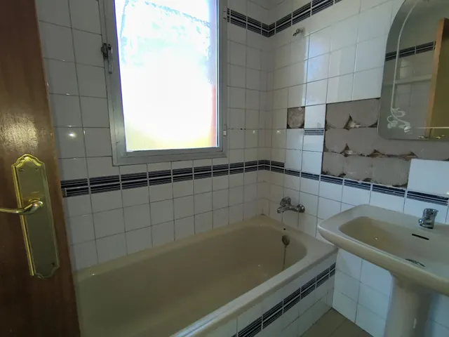 Piso en zona Pinilla con cuatro habitaciones, dos baños y  garaje — 10