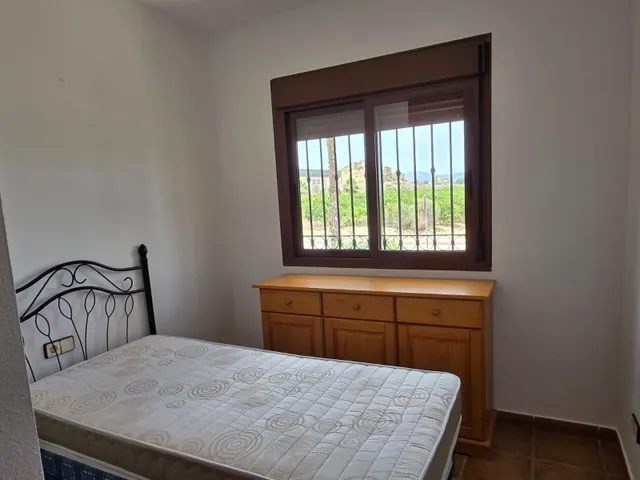 ADOSADO CON JARDÍN Y PISCINA COMUNITARIA EN CAMPO DE GOLF — 7