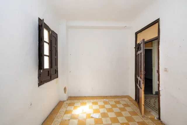 CONJUNTO DE PISOS Y PLANTA BAJA EN GRANADA CON 490 m2 — 11