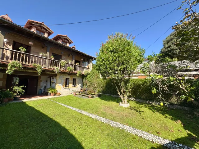 CASA CON JARDIN EN LIANDRES — 34