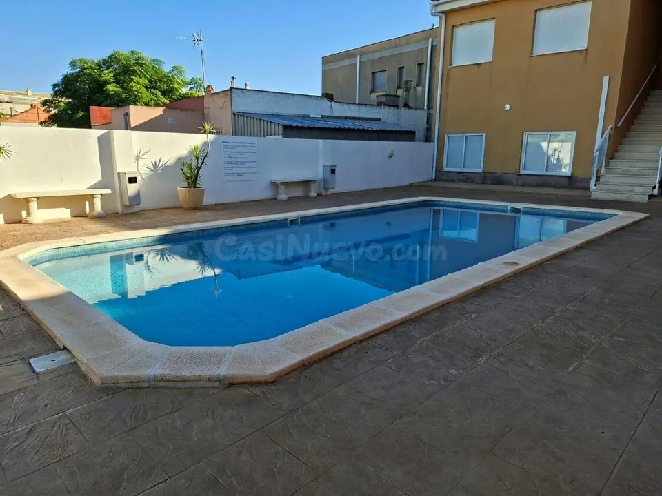 Apartamento en venta en Els Muntells con terraza, parking y piscina comunitaria