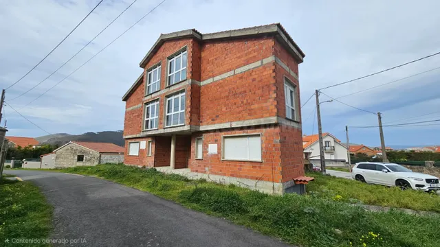 Dos viviendas adosadas en construcción en Camino da Insua — 