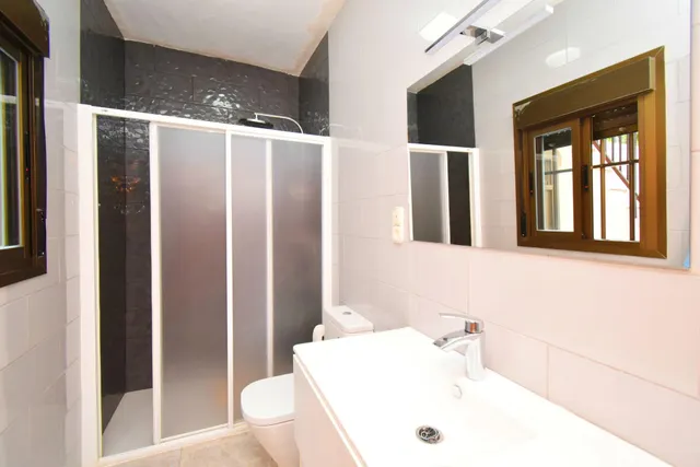 VIVIENDA DE PLANTA BAJA CON SOLARIUM Y COCHERA — 17