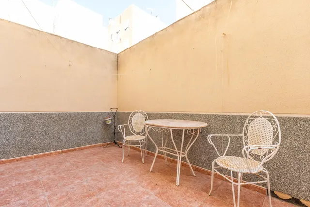Acogedor piso en planta baja con piscina comunitaria — 16
