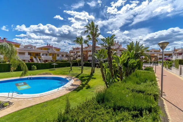 Residencial Zeniamar VIII – Acogedor adosado en esquina con solárium, piscina comunitaria, garaje y trastero — 44