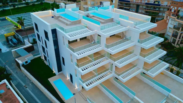 Apartamento en planta baja de obra nueva en exclusiva urbanización en primera línea de playa — 26