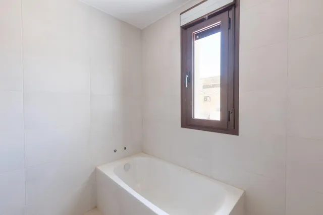 Espectacular casa adosasa de obra nueva — 24