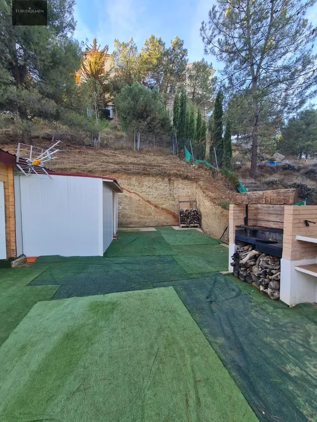 Parcela con una casita de madera en Cumbres Verdes. — 19
