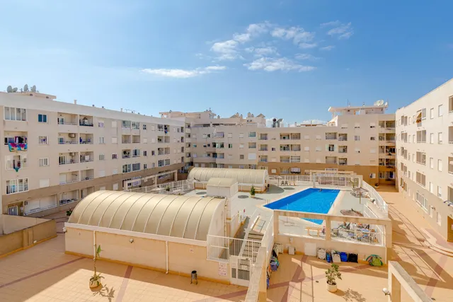 APARTAMENTO DE DOS DORMITORIOS CON VISTAS A LA LAGUNA ROSA Y CON PISCINA COMUNITARIA — 38