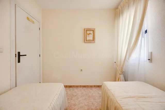 Bungalow planta alta de 3 dormitorios con piscina y plaza de garaje comunitaria. — 15