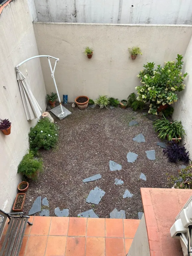 Espectacular Casa Unifamiliar con 2 Terrazas y Patio en el corazón de Hospitalet Centro — 36