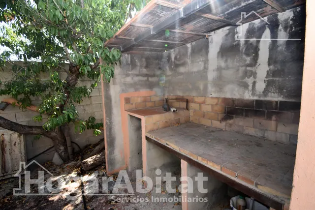 GRAN PARCELA CON VIVIENDA Y AMPLIA TERRAZA — 27