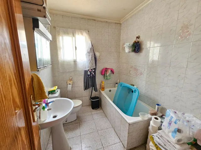 VIVIENDA CON TERRENO — 12