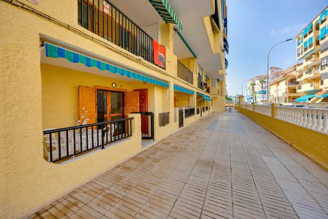 Apartamento de 1 dormitorio con plaza de garaje y piscina comunitaria en La Mata — 6
