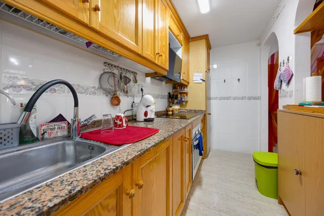 Bungalow de 2 dormitorios y piscina comunitaria en Orihuela Costa — 21