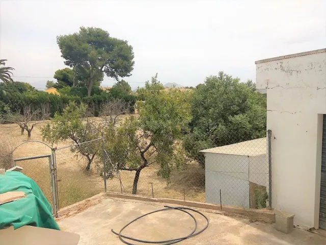 Oportunidad: Terreno Rústico de 1.122 m2 con Garaje en Santa