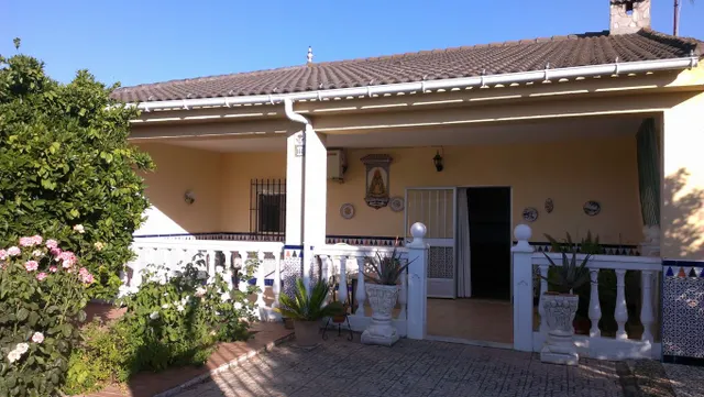 Venta de parcela con casa — 26
