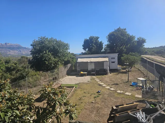 Se vende parcela con casa prefabricada zona La Nucia — 26