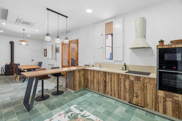Finca rústica con vivienda reformada, piscina y cultivo ecólógico — 15