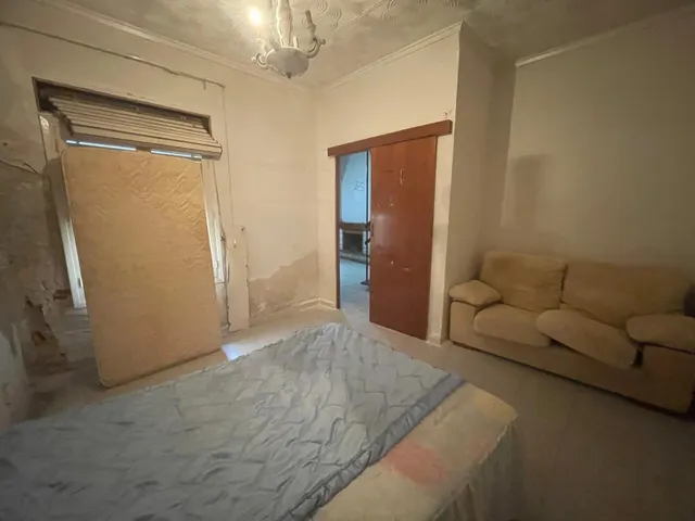 Amplia casa de 7 habitaciones para reformar en Rojales – 210 m2 — 25