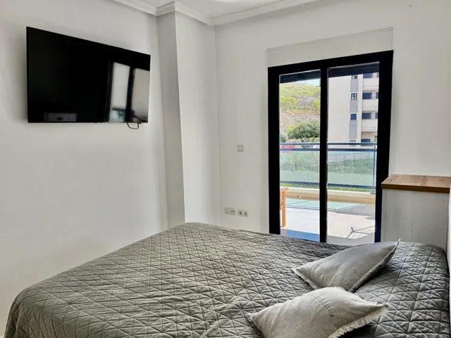 Apartamento reformado de 2 dormitorios con vistas al mar, piscina y parking en la cala de finestrat — 14