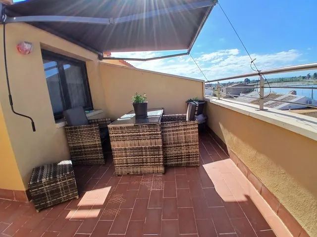 Ático duplex con terraza, parking y piscina comunitaria — 13