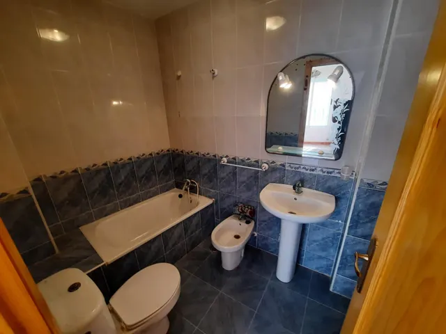 VIVIENDA EN PLANTA BAJA — 13