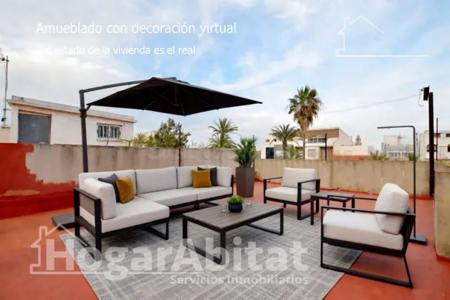 CASA CON DOS TERRAZAS Y UN LOCAL COMERCIAL