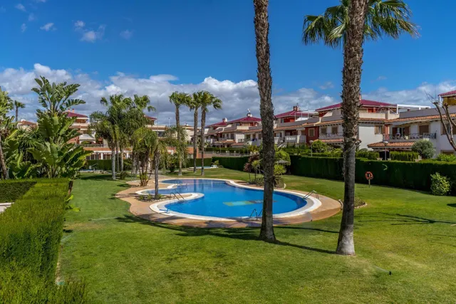 Residencial Zeniamar VIII – Acogedor adosado en esquina con solárium, piscina comunitaria, garaje y trastero — 43