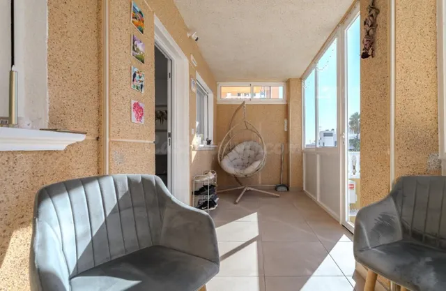 Apartamento moderno con amplias terrazas en Punta Prima | Or - foto 5