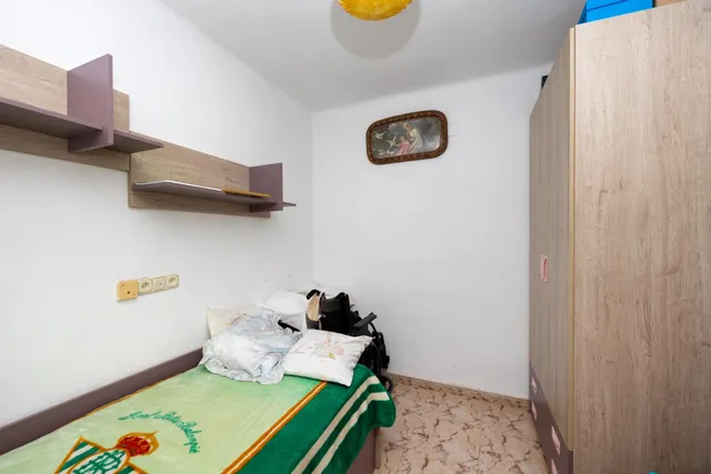 Vivienda en planta baja en el Zaidin. — 14