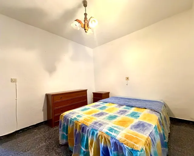 Casa de pueblo en pleno centro de La Joya con dos viviendas independientes y parcela de 500 m2 — 25