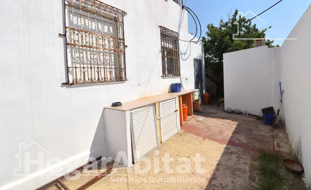 GRAN PARCELA CON VIVIENDA Y AMPLIA TERRAZA — 26