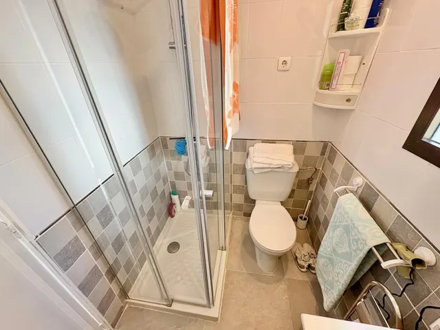 Casa adosada con dos patios privados y piscina comunitaria en Caleta de Vélez — 21
