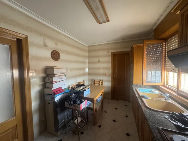 Edificio de dos apartamentos con terraza y garaje — 27
