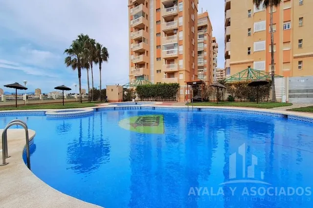 Apartamento en venta con terraza, piscina comunitaria y plaza de garaje, en la manga del mar menor, zona del estacio — 27