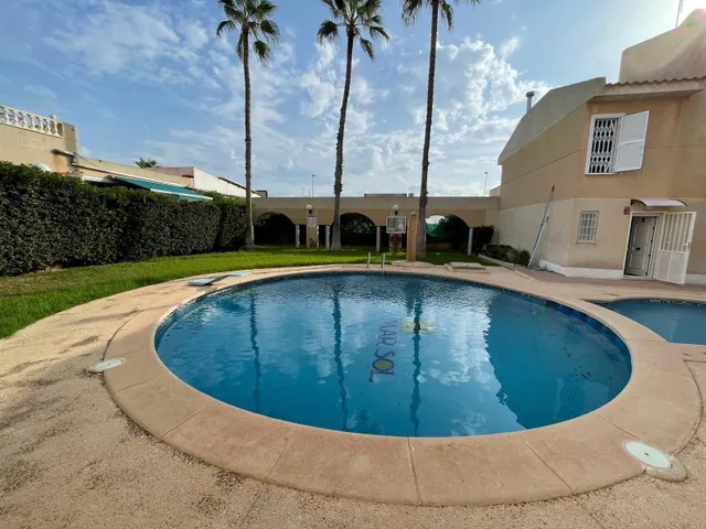 MAGNIFICO CHALET ADOSADO CON PISCINA COMUNITARIA Y VISTAS AL MAS — 34