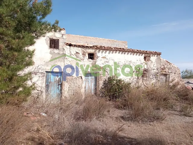 11Hectareas de terreno , vivienda y agua