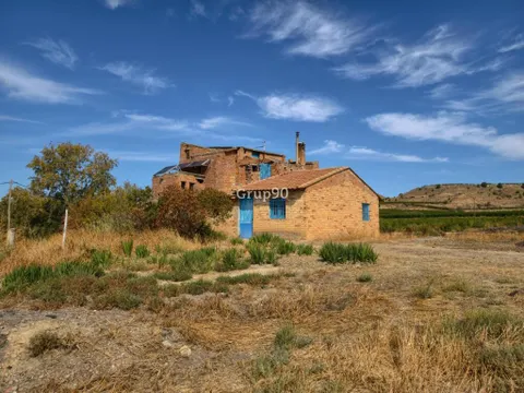 TERRENO DE 7.274 m2 CON CASA A REFORMAR, A 10 MINUTOS DE LLEIDA