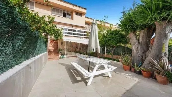 Elegante casa adosada con piscina en Cala Major - foto 2