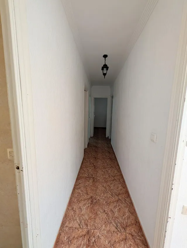 Amplio Piso en Ayamonte con Vistas Despejadas y Gran Potencial — 12