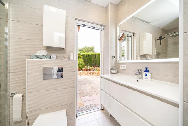 Planta baja totalmente reformada con jardín privado, sauna, piscina comunitaria y parking en Sa Coma — 20