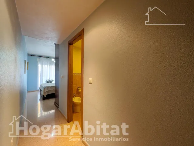 EXTERIOR CON DOS BALCONES Y GARAJE — 33