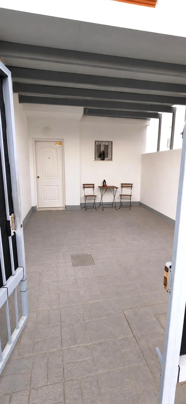 Casa de esquina con patio y chimenea en Villaverde del Río — 8